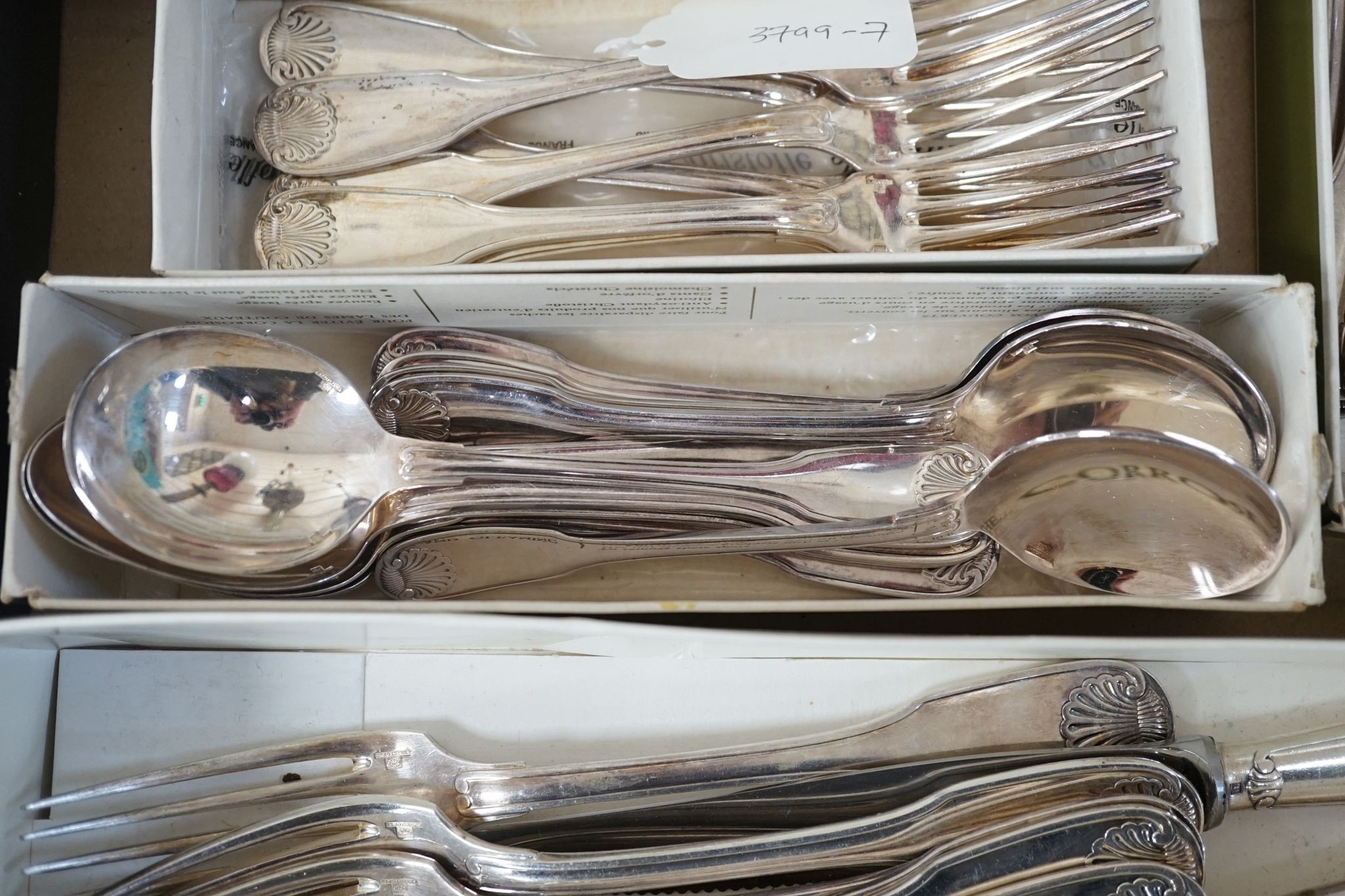A Chistofle plated canteen of fiddle and shell pattern cutlery
